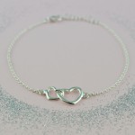 Lily Charmed Silver Linked Hearts Bracelet